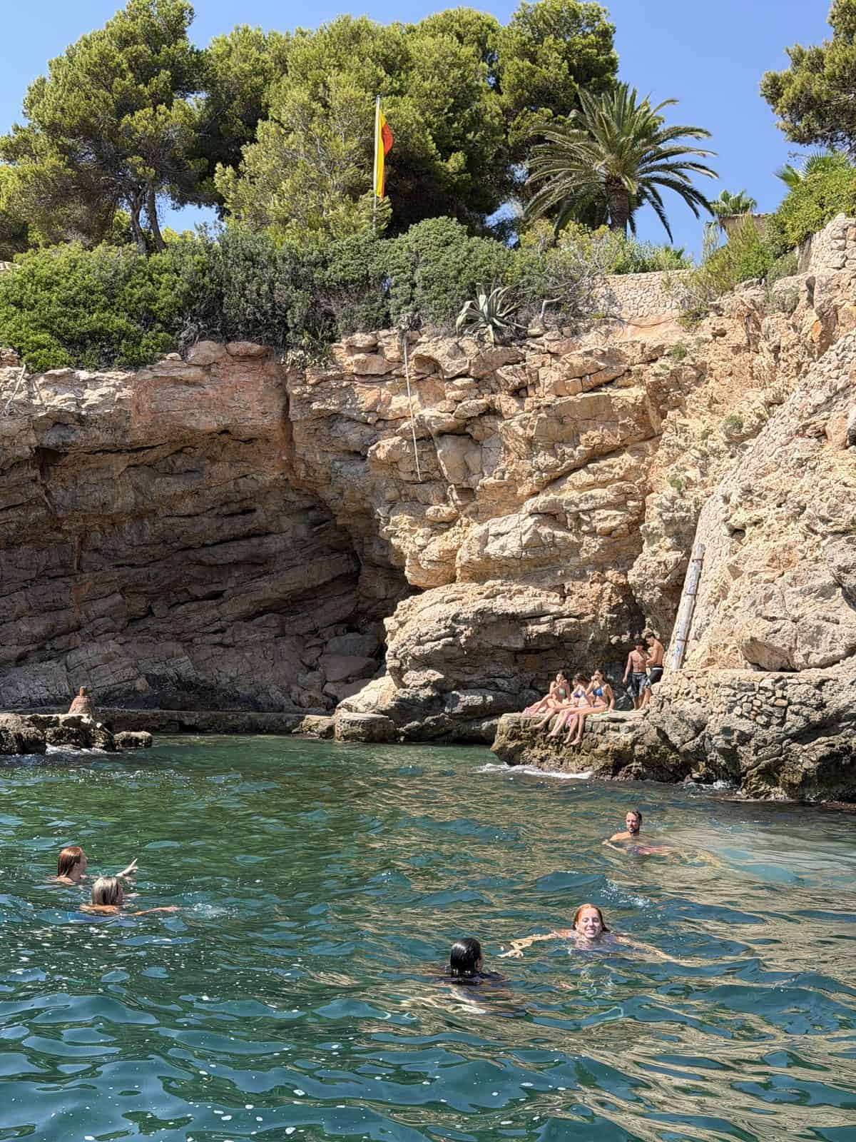 Swimming in a cliff cove on our boat day
